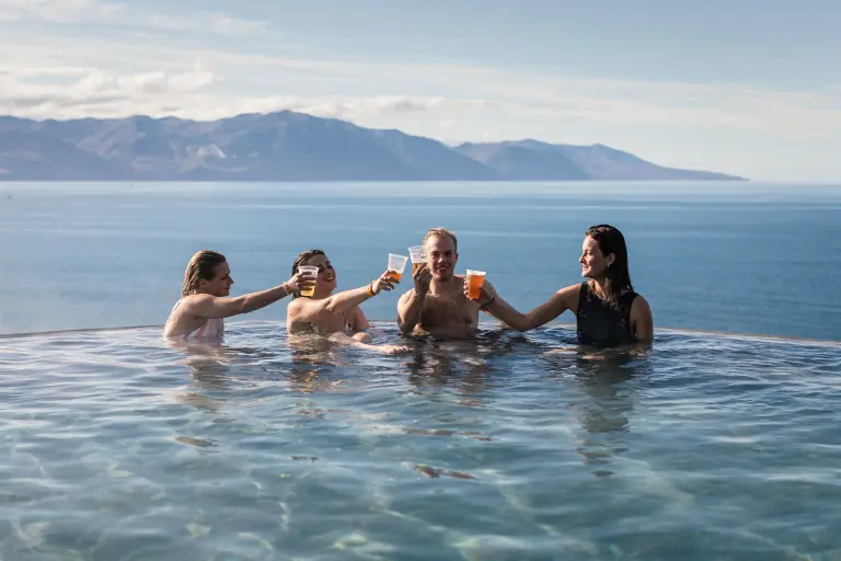 People celebrating at the GeoSea pool