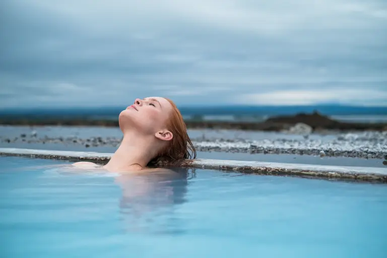 Myvatn Nature Baths - Blue pool amid volcanic rocks